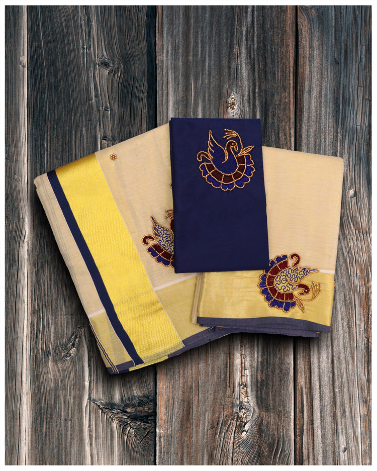 This Golden Tissue Set Mundu with Gold and Blue Kara is perfect for festive occasions. It is made from premium quality fabric with a royal finish and look. The kara offers a unique blend of gold and blue, giving you an eye-catching traditional look. Be confident in knowing you&